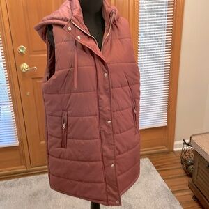 Never worn hooded, sleeveless long puffer jacket by DIP.